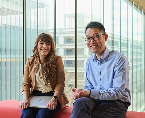 Two business people with a laptop. Two business people with a laptop.